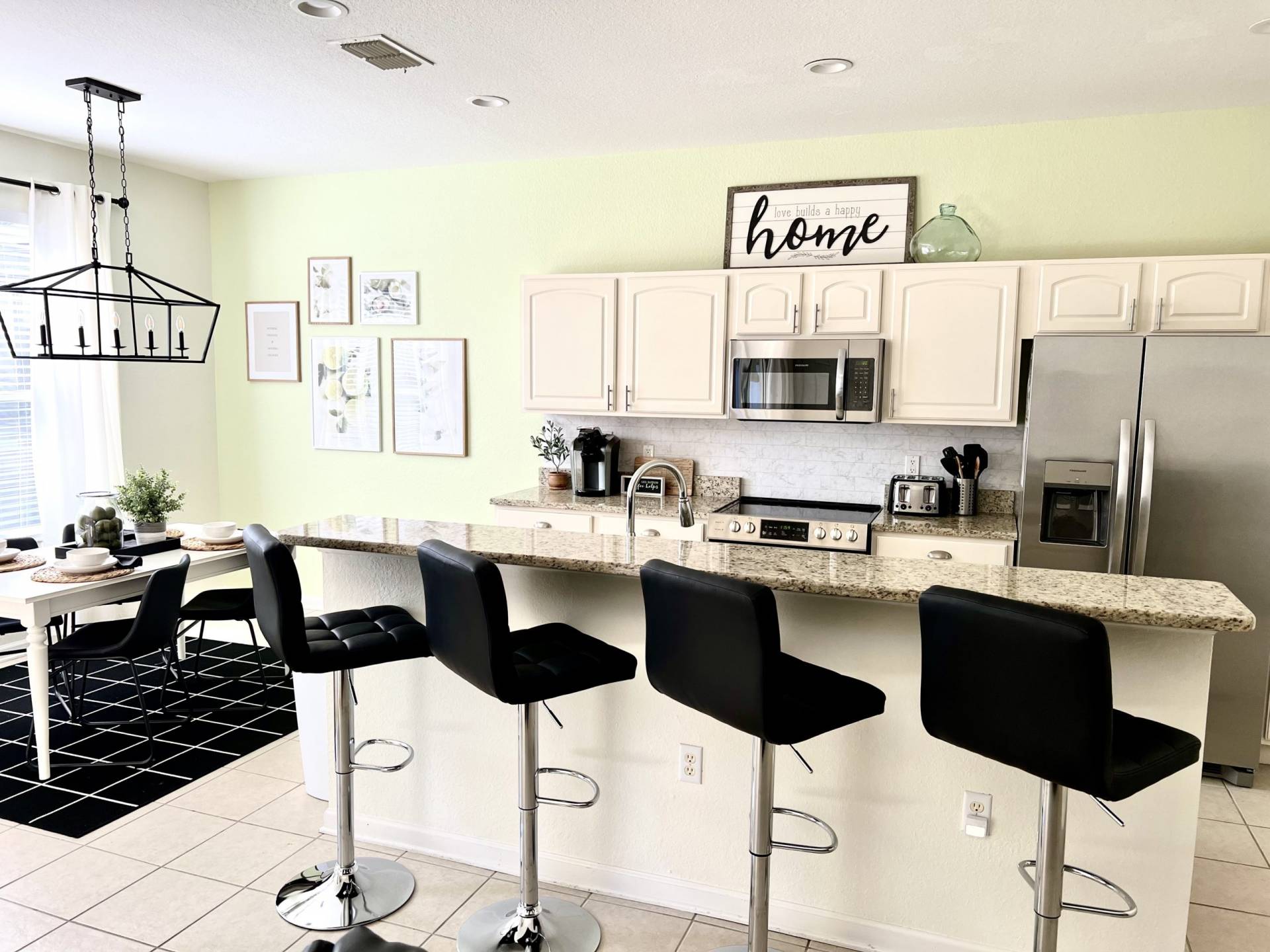 Memory Lane Villa Vacation Rental Home in Windsor Hills Florida Kitchen with Barstools and Dining Nook