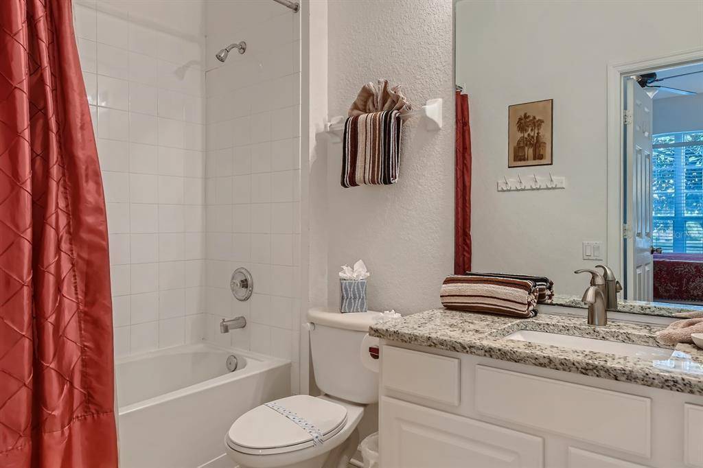 Bathroom with Shower and Tub Combo  at Memory Lane Villa in Windsor Hills Vacation Rental Community Florida