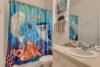 Nemo Shower Curtain Bathroom with Tub and Shower Combo at Memory Lane Villa in Windsor Hills Vacation Rental Home Community Orlando Florida