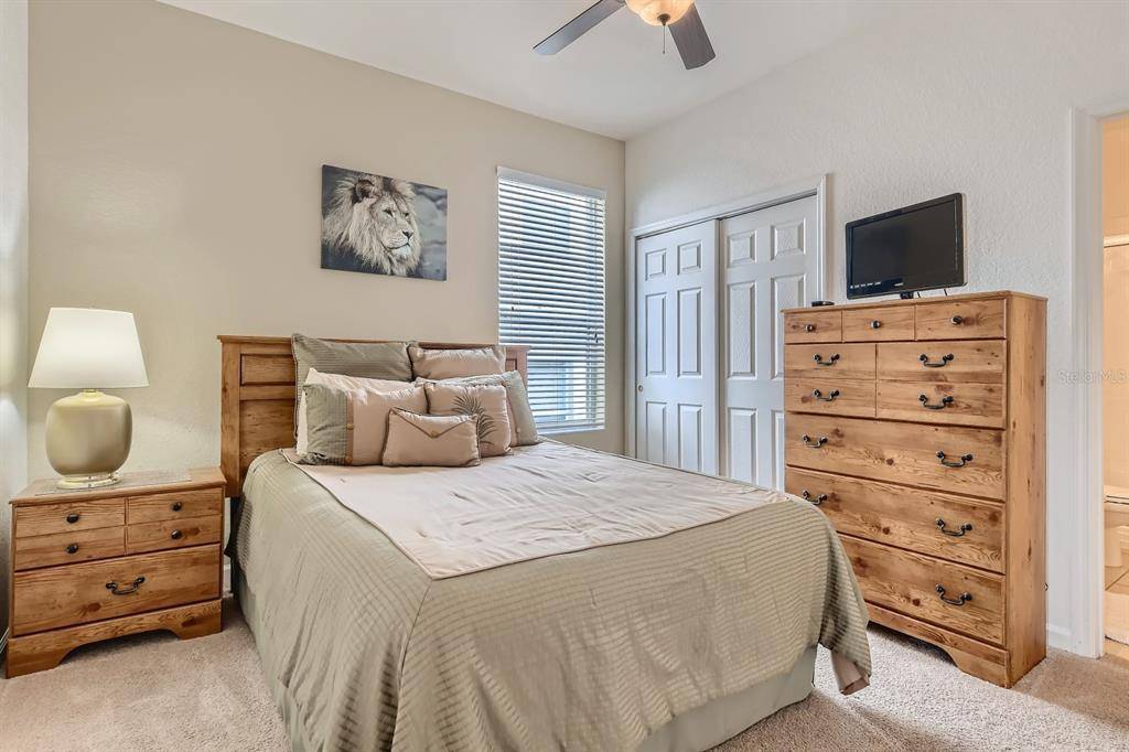 Bedroom with Queen Sized Bed  at Memory Lane Villa in Windsor Hills Vacation Rental Community Florida